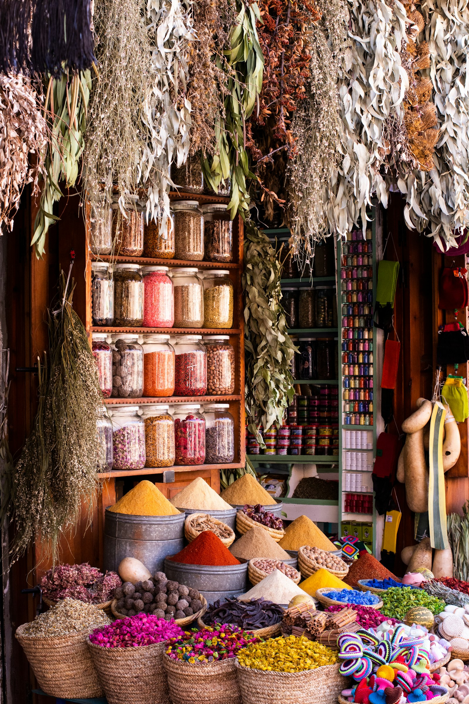 A bustling open-air spice market with vivid stalls of saffron and chillies